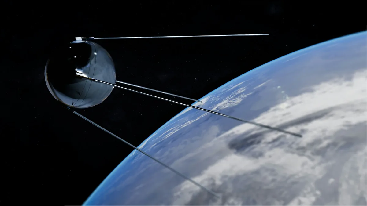 A satellite orbiting the Earth, with the planet's surface visible in the background.