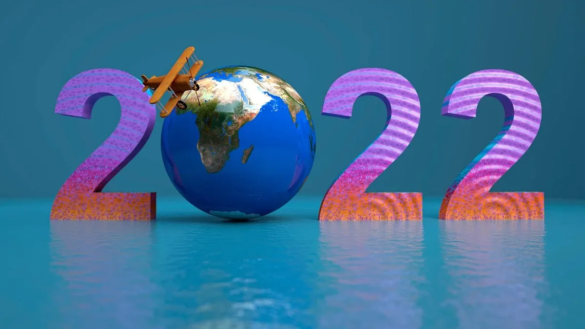 A globe with a satellite in front of it, set against a blue background.